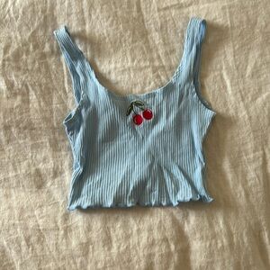 Baby girl crop top with cherry decal. Baby blue